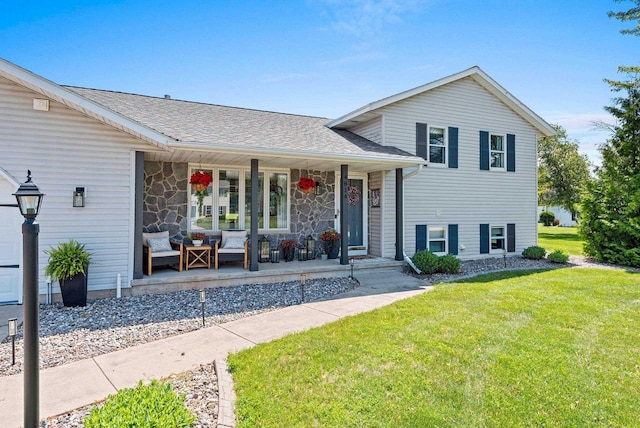 4814 Placid Way, New Franken, WI 54229 - split level home with covered porch, a front yard, stone siding, and roof with shingles