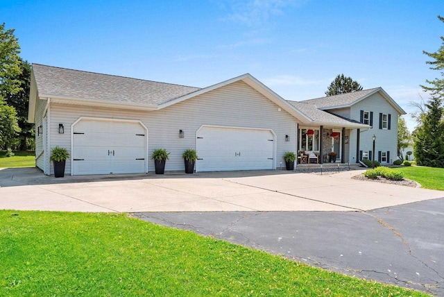 4814 Placid Way, New Franken, WI 54229 - tri-level home with a garage, covered porch, concrete driveway, a front lawn, and roof with shingles