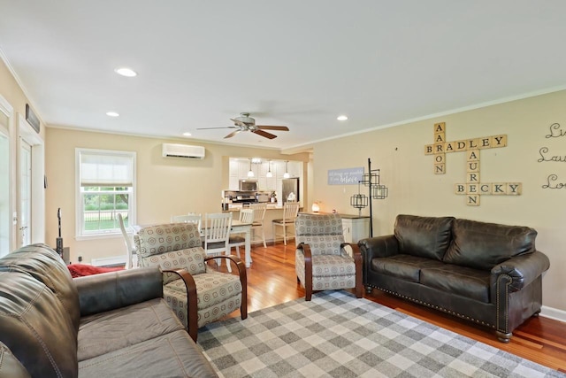 511 Wisconsin River Dr, Port Edwards, WI 54469 - living area with an AC wall unit, crown molding, light wood finished floors, ceiling fan, and recessed lighting
