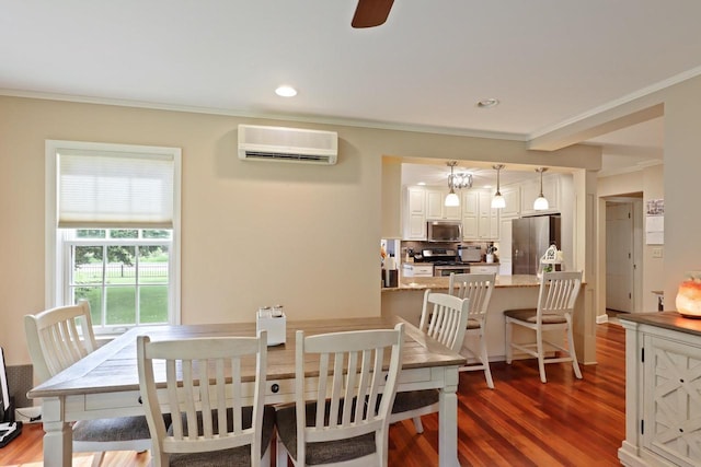 511 Wisconsin River Dr, Port Edwards, WI 54469 - dining room featuring a wall mounted air conditioner, ornamental molding, wood finished floors, recessed lighting, and a ceiling fan