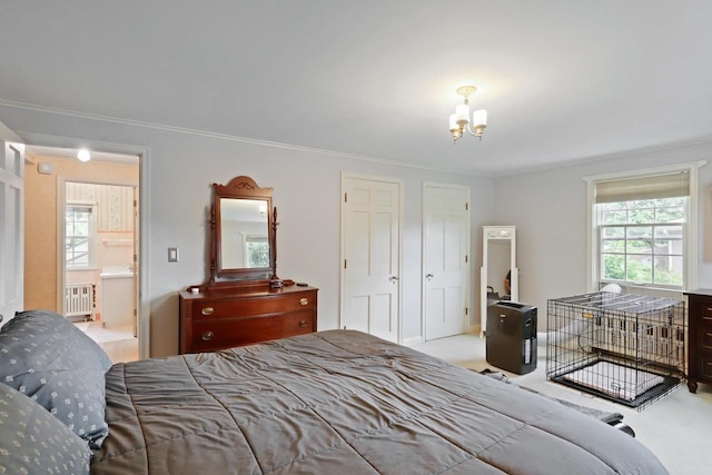 511 Wisconsin River Dr, Port Edwards, WI 54469 - bedroom featuring a chandelier, carpet, radiator heating unit, and ornamental molding