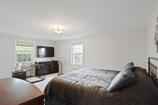 511 Wisconsin River Dr, Port Edwards, WI 54469 - bedroom with crown molding, a chandelier, and radiator