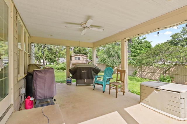 511 Wisconsin River Dr, Port Edwards, WI 54469 - fenced backyard with a patio, grilling area, and a ceiling fan