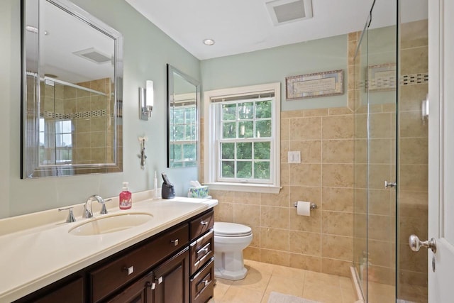 511 Wisconsin River Dr, Port Edwards, WI 54469 - full bath featuring a shower stall, vanity, tile patterned floors, and tile walls