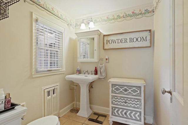 511 Wisconsin River Dr, Port Edwards, WI 54469 - half bathroom with toilet and tile patterned floors