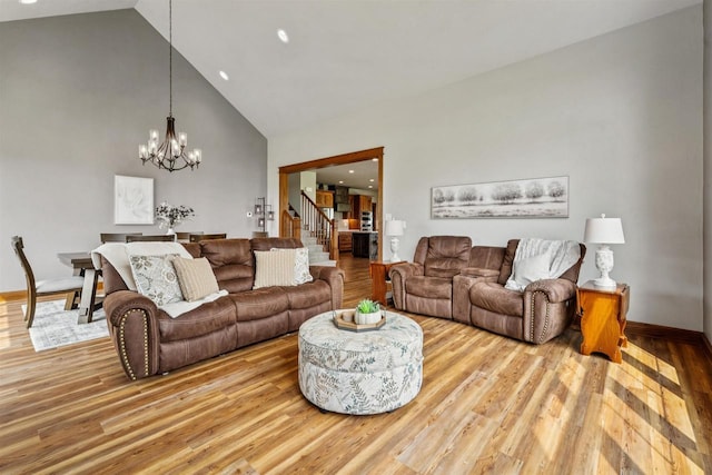 W9336 Lucy Ln, Hortonville, WI 54944 - living room featuring high vaulted ceiling, a chandelier, stairway, wood finished floors, and recessed lighting