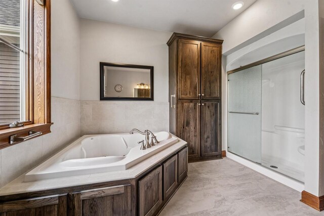 W9336 Lucy Ln, Hortonville, WI 54944 - bathroom featuring a whirlpool tub, a shower stall, and recessed lighting