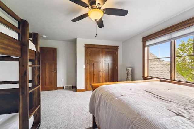 W9336 Lucy Ln, Hortonville, WI 54944 - bedroom with carpet flooring, a closet, and a ceiling fan