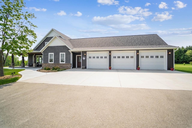 W9336 Lucy Ln, Hortonville, WI 54944 - view of front of house featuring driveway, an attached garage, and a shingled roof