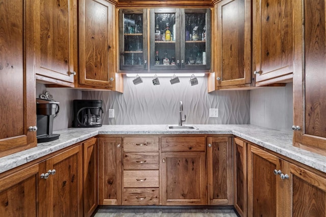 W9336 Lucy Ln, Hortonville, WI 54944 - kitchen featuring brown cabinets and glass insert cabinets
