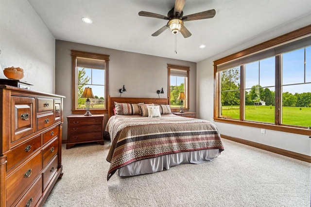 W9336 Lucy Ln, Hortonville, WI 54944 - bedroom featuring light colored carpet, multiple windows, recessed lighting, and a ceiling fan