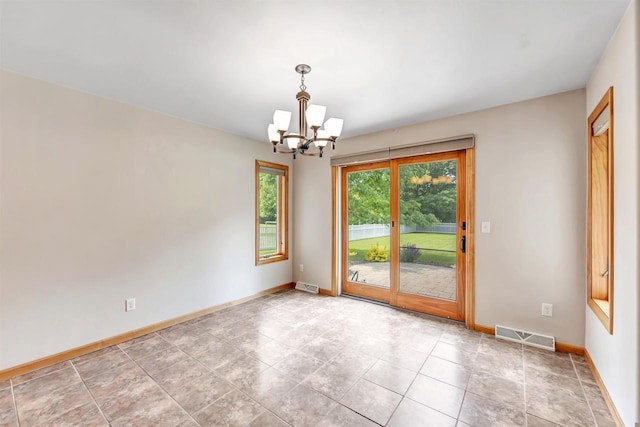 665 Black Earth Dr, De Pere, WI 54115 - empty room featuring a chandelier and baseboards