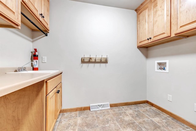 665 Black Earth Dr, De Pere, WI 54115 - washroom featuring washer hookup and cabinet space
