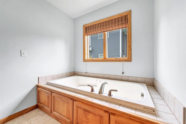665 Black Earth Dr, De Pere, WI 54115 - bathroom with a bath and tile patterned floors
