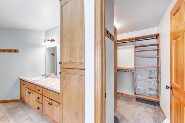 665 Black Earth Dr, De Pere, WI 54115 - bathroom featuring double vanity and baseboards