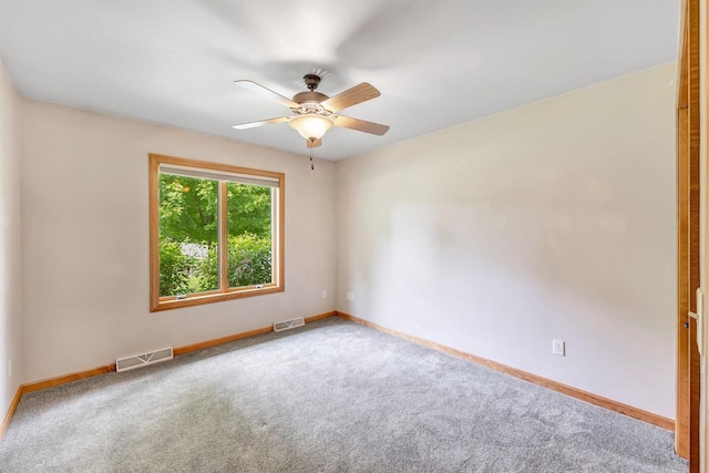 665 Black Earth Dr, De Pere, WI 54115 - carpeted spare room with a ceiling fan and baseboards