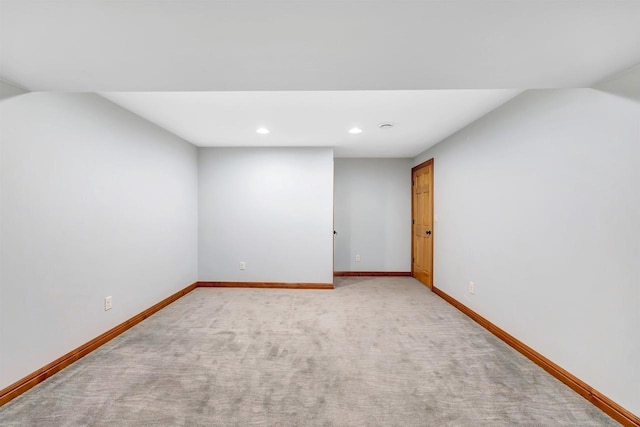 665 Black Earth Dr, De Pere, WI 54115 - spare room with recessed lighting, vaulted ceiling, and light carpet