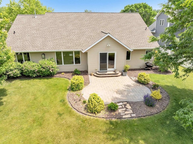 665 Black Earth Dr, De Pere, WI 54115 - rear view of property with roof with shingles, a patio, and a yard