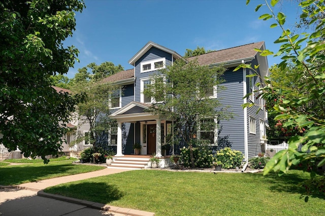 225 8th St, South Street, La Crosse, WI 54601 - view of front of home with a front lawn and a porch