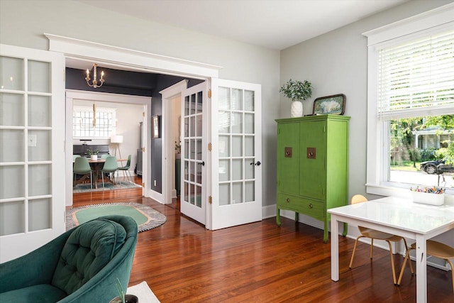 225 8th St, South Street, La Crosse, WI 54601 - office area featuring a chandelier, wood finished floors, and french doors