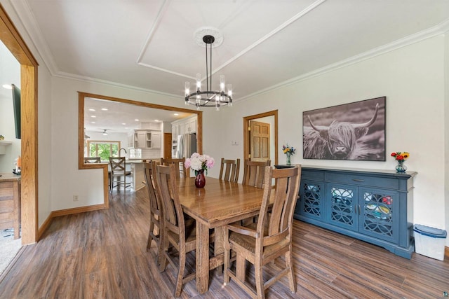 3287 E Old Highway 105, Superior, WI 54880 - dining space with dark wood finished floors, a chandelier, and ornamental molding