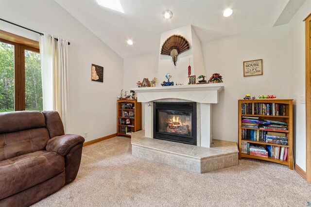 3287 E Old Highway 105, Superior, WI 54880 - carpeted living room with a tile fireplace, vaulted ceiling, and recessed lighting