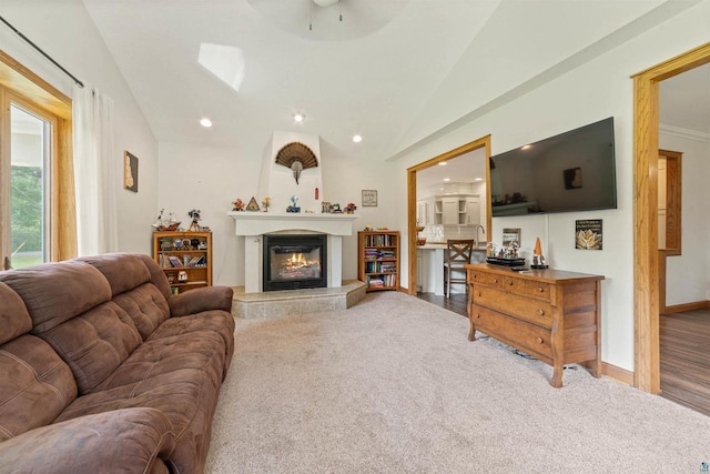 3287 E Old Highway 105, Superior, WI 54880 - carpeted living room featuring a glass covered fireplace, vaulted ceiling, recessed lighting, and a ceiling fan