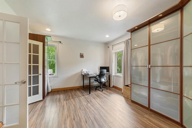 3287 E Old Highway 105, Superior, WI 54880 - office featuring wood finished floors, french doors, plenty of natural light, and recessed lighting