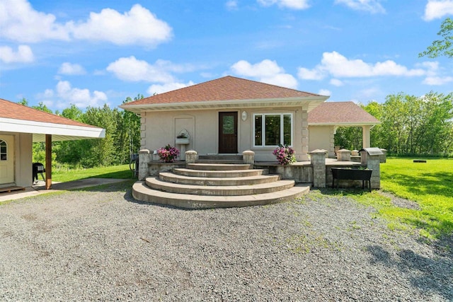 3287 E Old Highway 105, Superior, WI 54880 - rear view of property featuring a lawn and stucco siding