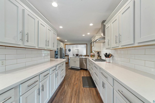 3287 E Old Highway 105, Superior, WI 54880 - kitchen featuring stainless steel appliances, wall chimney range hood, recessed lighting, a peninsula, and backsplash