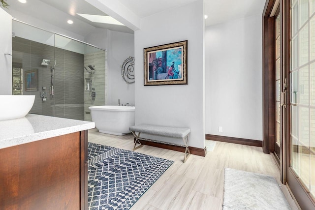 W1977 Center Valley Rd, Kaukauna, WI 54130 - full bathroom featuring a shower stall, a soaking tub, vanity, and recessed lighting