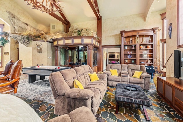 W1977 Center Valley Rd, Kaukauna, WI 54130 - living room with high vaulted ceiling, beam ceiling, and a chandelier