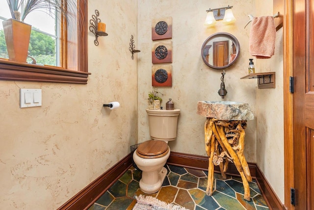 W1977 Center Valley Rd, Kaukauna, WI 54130 - half bath with toilet and baseboards