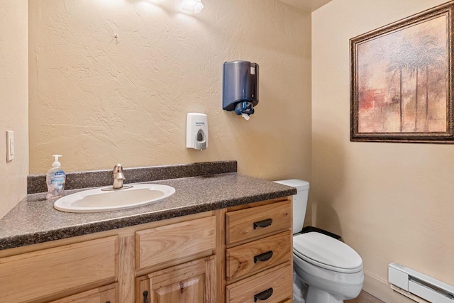 W1977 Center Valley Rd, Kaukauna, WI 54130 - bathroom featuring a baseboard heating unit and vanity