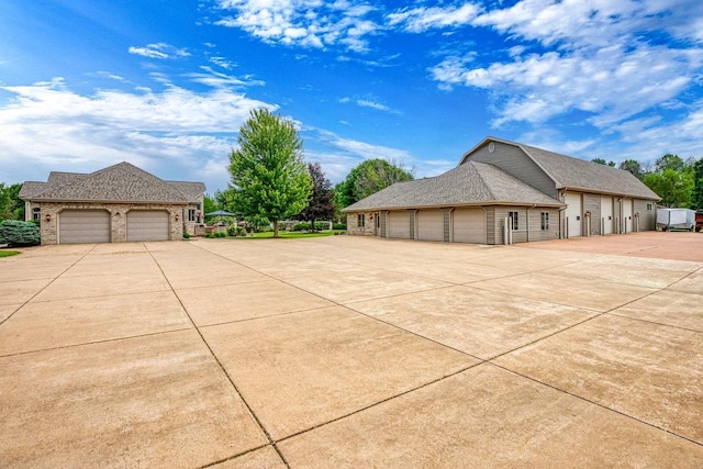 W1977 Center Valley Rd, Kaukauna, WI 54130 - view of property exterior featuring brick siding and a garage