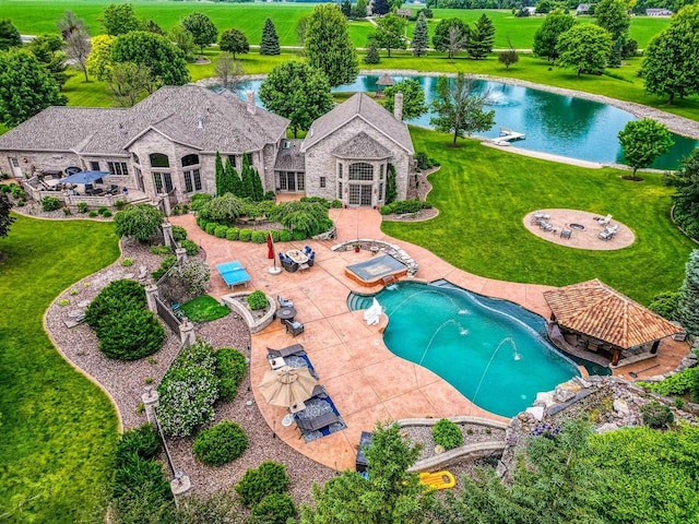 W1977 Center Valley Rd, Kaukauna, WI 54130 - swimming pool with a lawn, a patio, and a water view