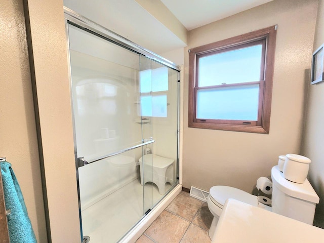 1239 Columbus Ave, Sheboygan, WI 53083 - bathroom featuring a stall shower and tile patterned floors