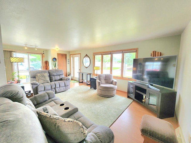 1239 Columbus Ave, Sheboygan, WI 53083 - living area with light wood-type flooring and track lighting