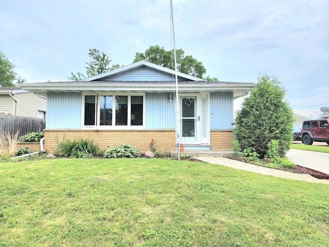 1239 Columbus Ave, Sheboygan, WI 53083 - view of front facade featuring brick siding