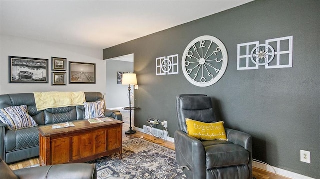 12901 7th St, Osseo, WI 54758 - living area featuring wood finished floors and baseboards