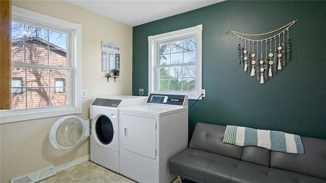 12901 7th St, Osseo, WI 54758 - washroom with washing machine and clothes dryer and baseboards