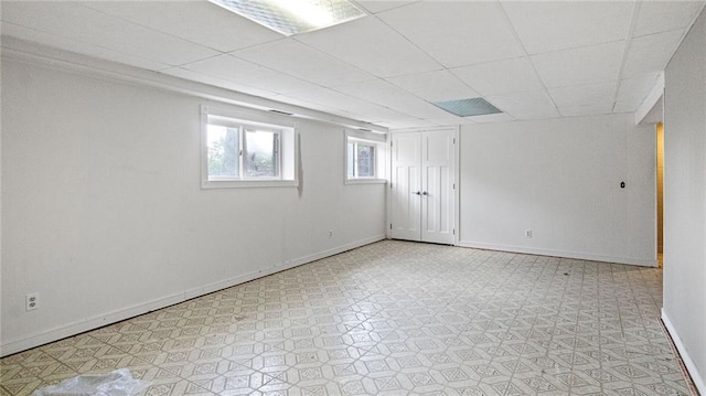 12901 7th St, Osseo, WI 54758 - below grade area with a drop ceiling and light floors