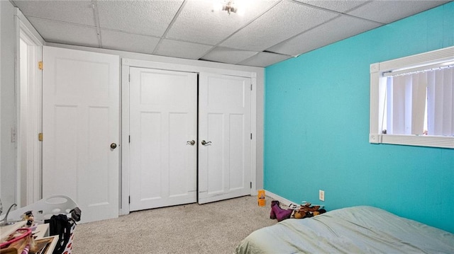 12901 7th St, Osseo, WI 54758 - carpeted bedroom featuring a paneled ceiling and a closet