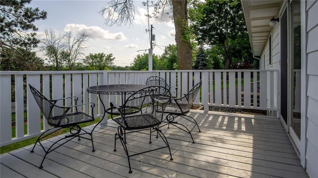 12901 7th St, Osseo, WI 54758 - wooden deck featuring outdoor dining space