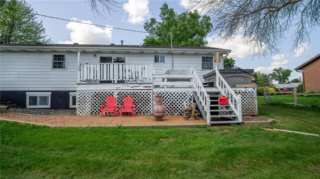 12901 7th St, Osseo, WI 54758 - rear view of property with a yard, a deck, and stairs