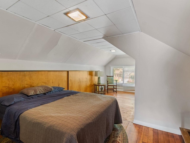 2221 N 60th St, Milwaukee, WI 53208 - bedroom featuring lofted ceiling and hardwood / wood-style flooring