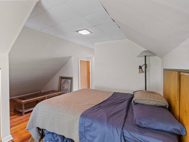 2221 N 60th St, Milwaukee, WI 53208 - bedroom featuring wood finished floors and lofted ceiling