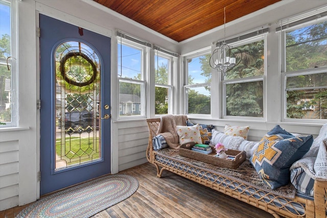 128 Maple Ave, Hartland, WI 53029 - sunroom featuring ornamental molding, wooden ceiling, and hardwood / wood-style floors