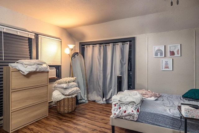 863 Jackson St, Oshkosh, WI 54901 - bedroom with lofted ceiling and wood finished floors