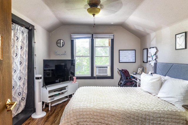 863 Jackson St, Oshkosh, WI 54901 - bedroom with lofted ceiling, cooling unit, wood finished floors, a textured ceiling, and ceiling fan